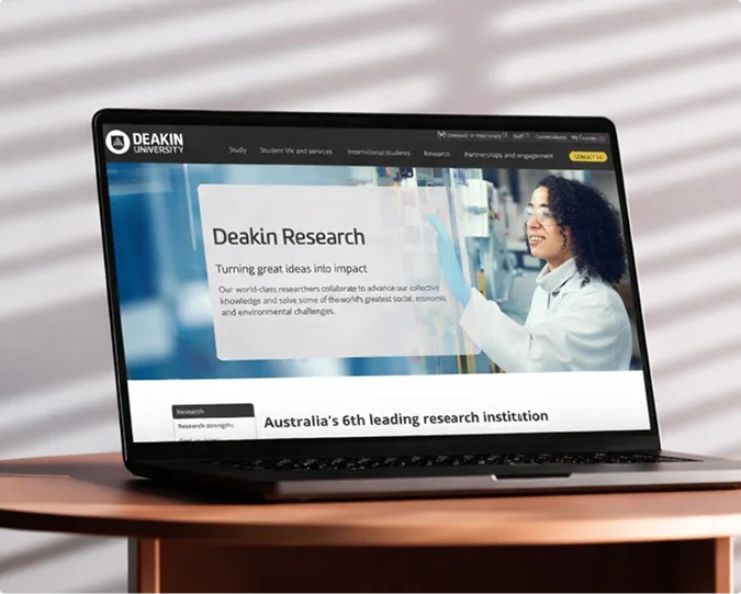Deakin University Research website displayed on a laptop